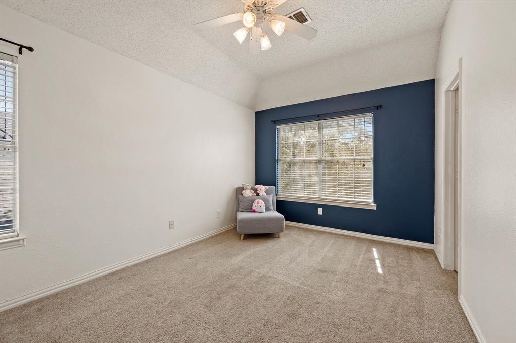 417 Shade Tree Circle Hurst, TX 76054 - Photo 29 of 39 a view of an empty room with a window