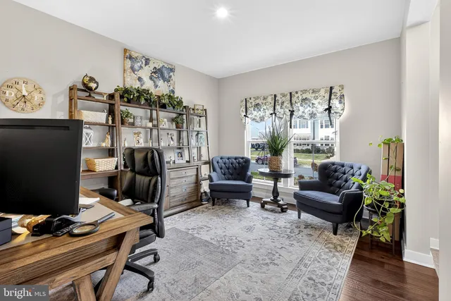 a bed room with furniture and a window