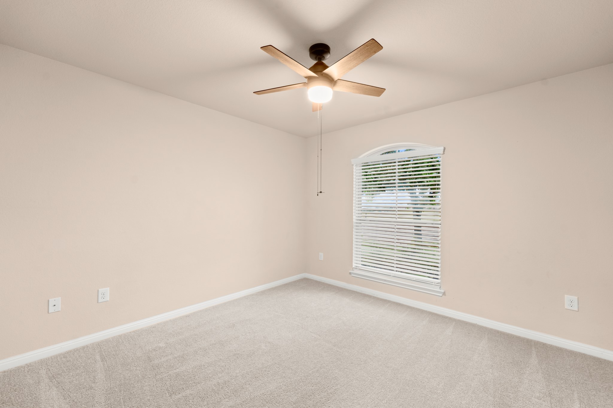 305 Longhorn Cavern Road Leander, TX 78641 - Photo 14 of 21 Bedroom #3 Clean, bright, and move-in ready. This bedroom features neutral tones and a stylish ceiling fan to keep things cool.