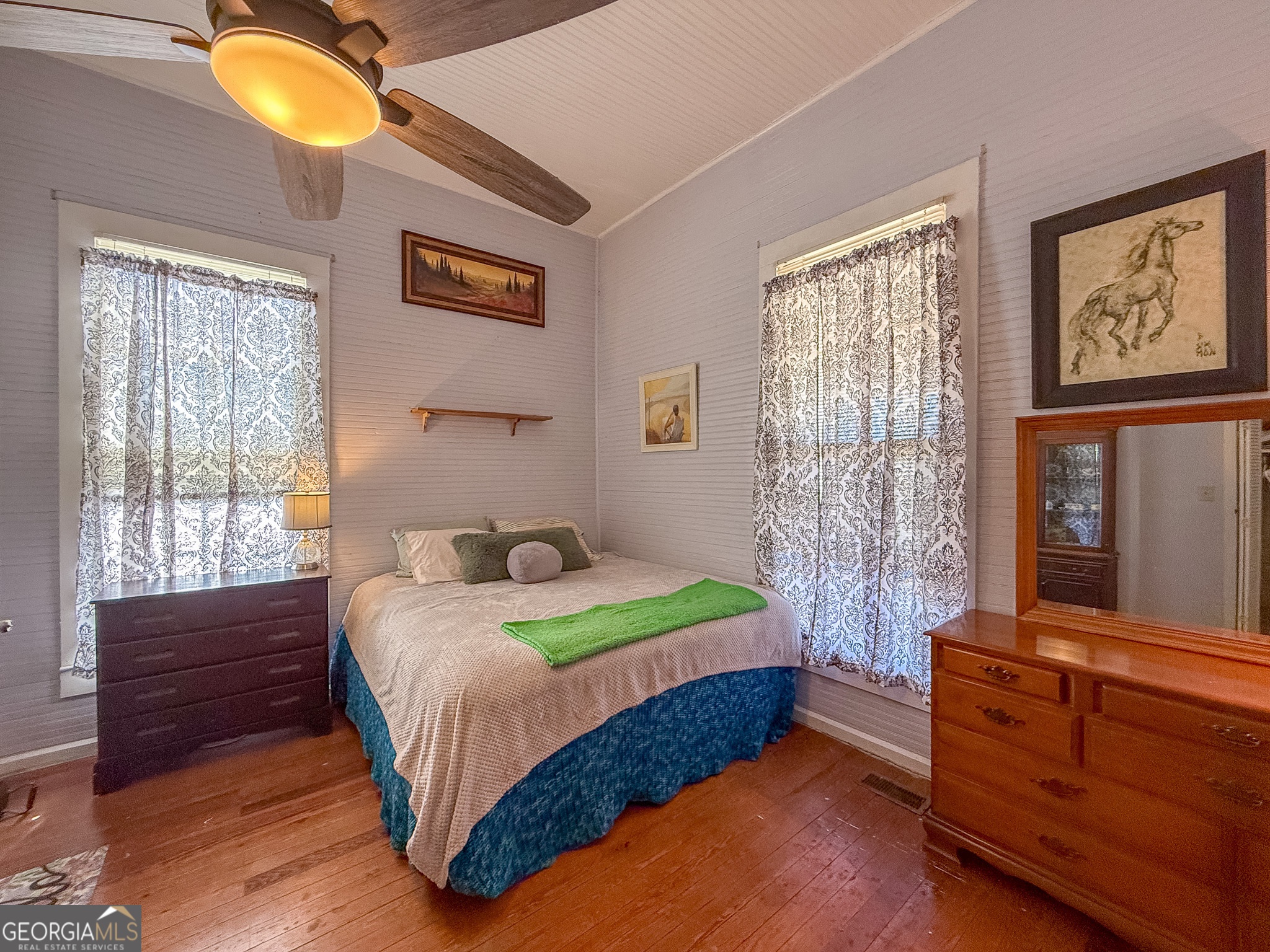 162 College Street Parrott, GA 39877 - Photo 13 of 30 a bedroom with a bed and a window