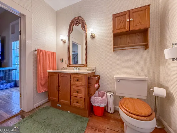 a bathroom with a shower and a sink