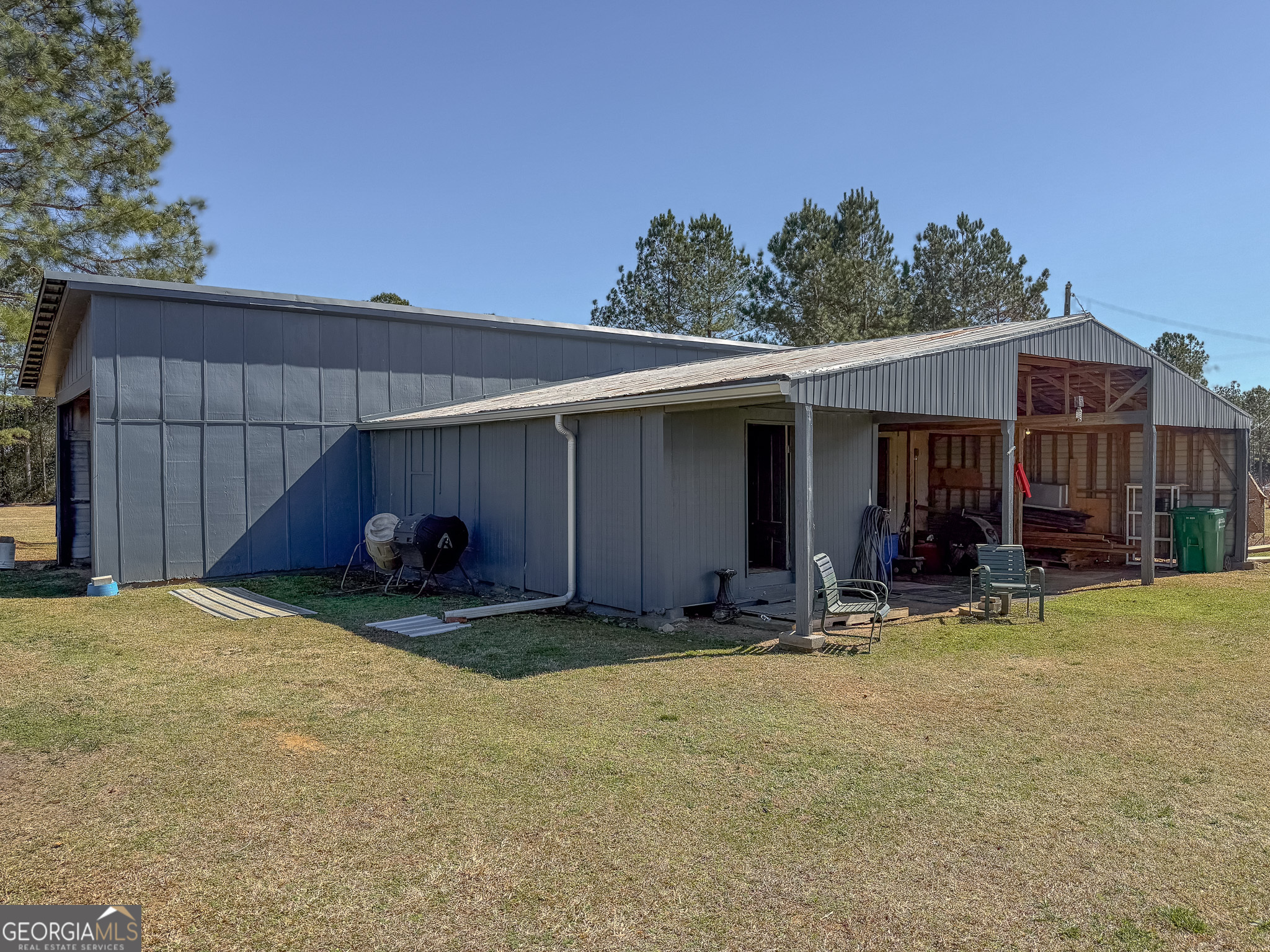 162 College Street Parrott, GA 39877 - Photo 22 of 30 a view of a house with backyard and sitting area