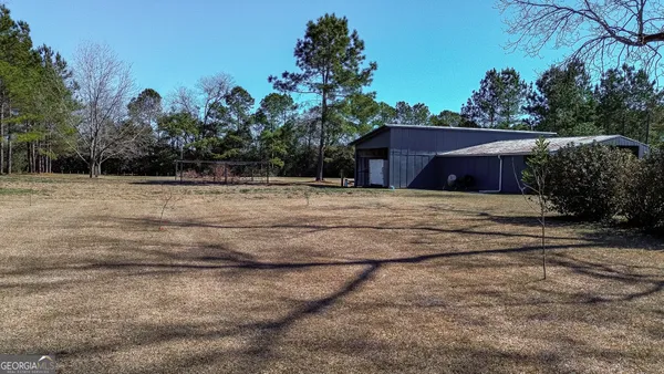 a view of outdoor space and yard