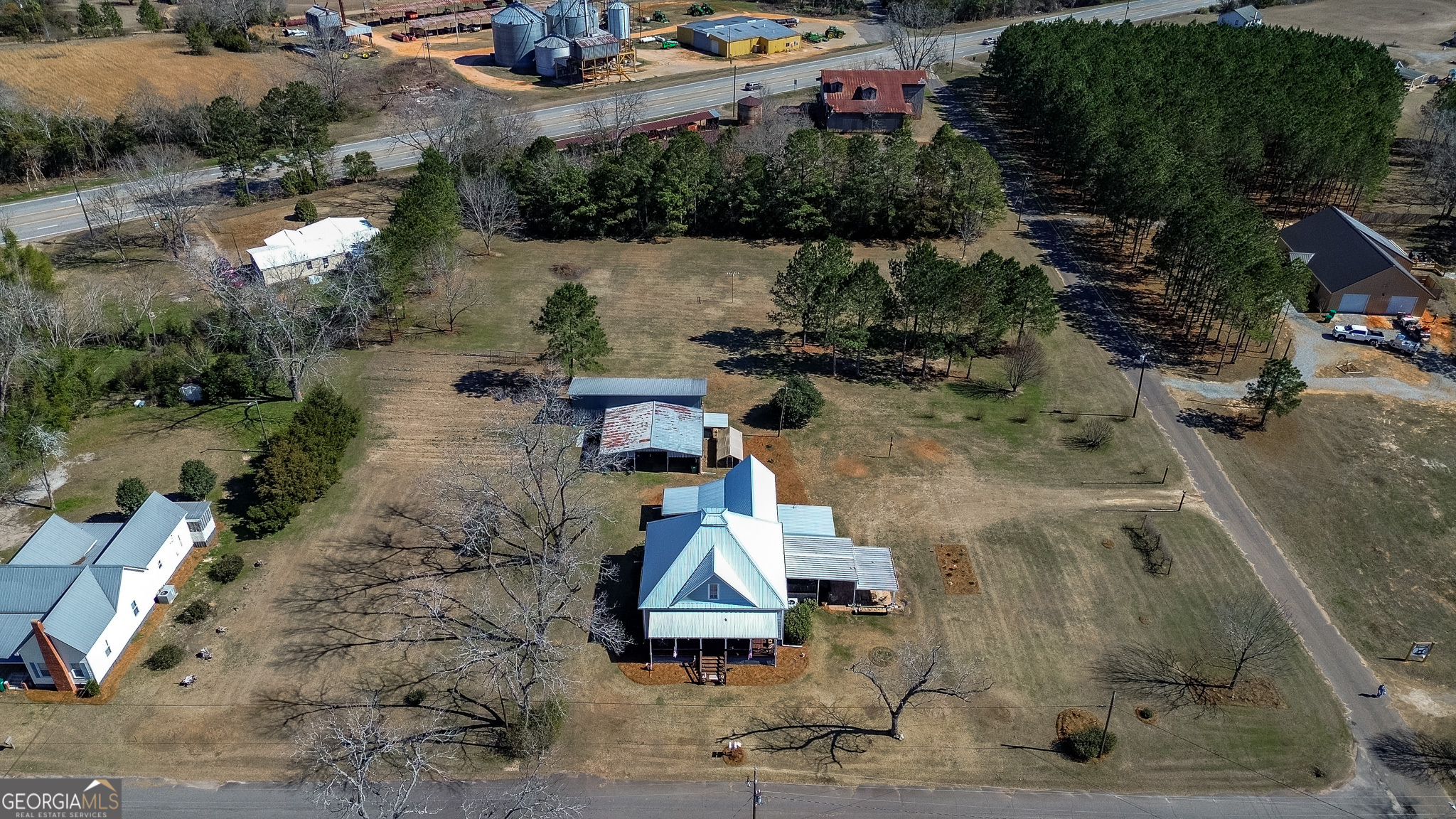 162 College Street Parrott, GA 39877 - Photo 29 of 30 an aerial view of a house with a yard basket ball court and outdoor seating