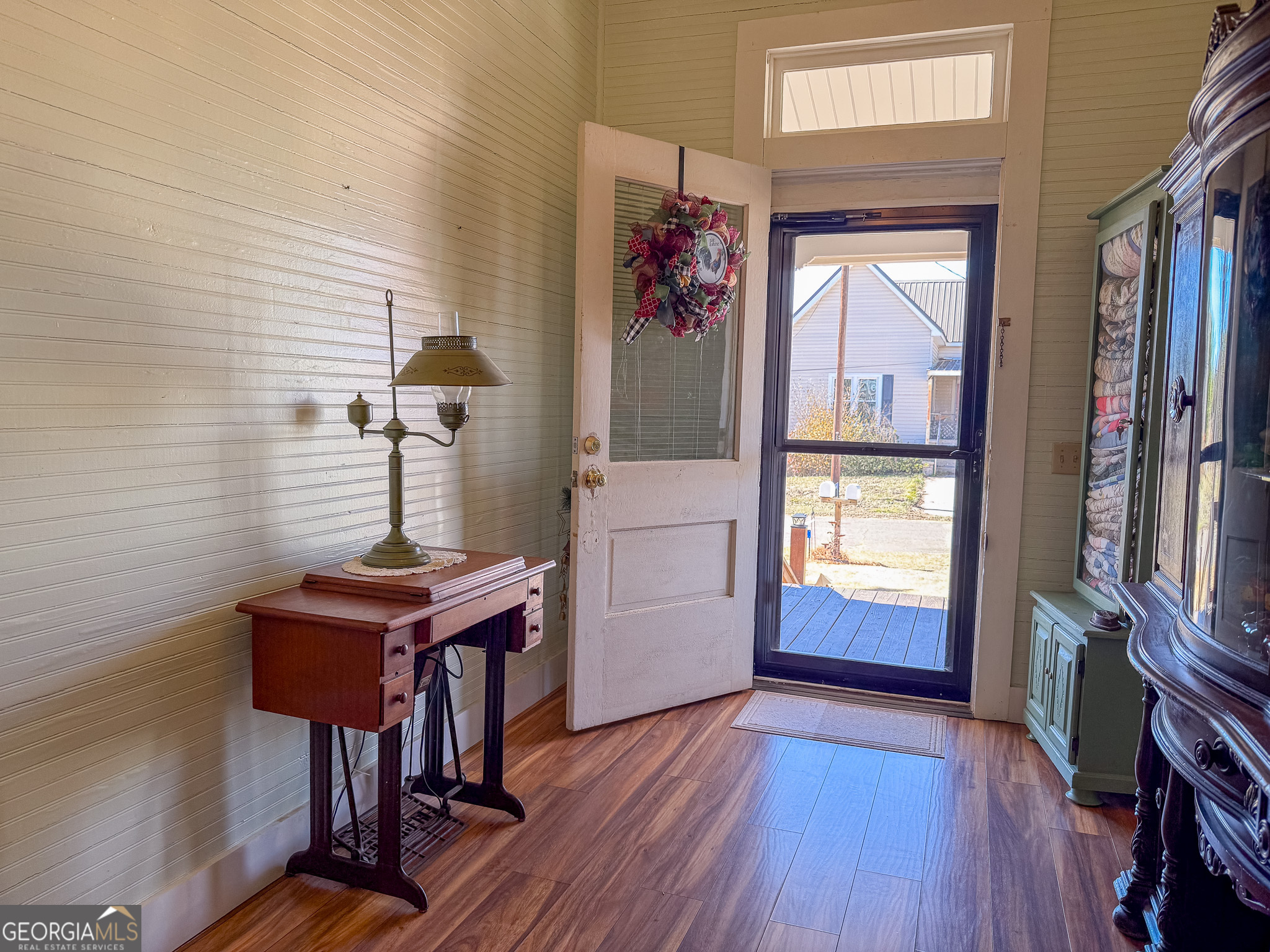 162 College Street Parrott, GA 39877 - Photo 8 of 30 a view of an entryway with wooden floor