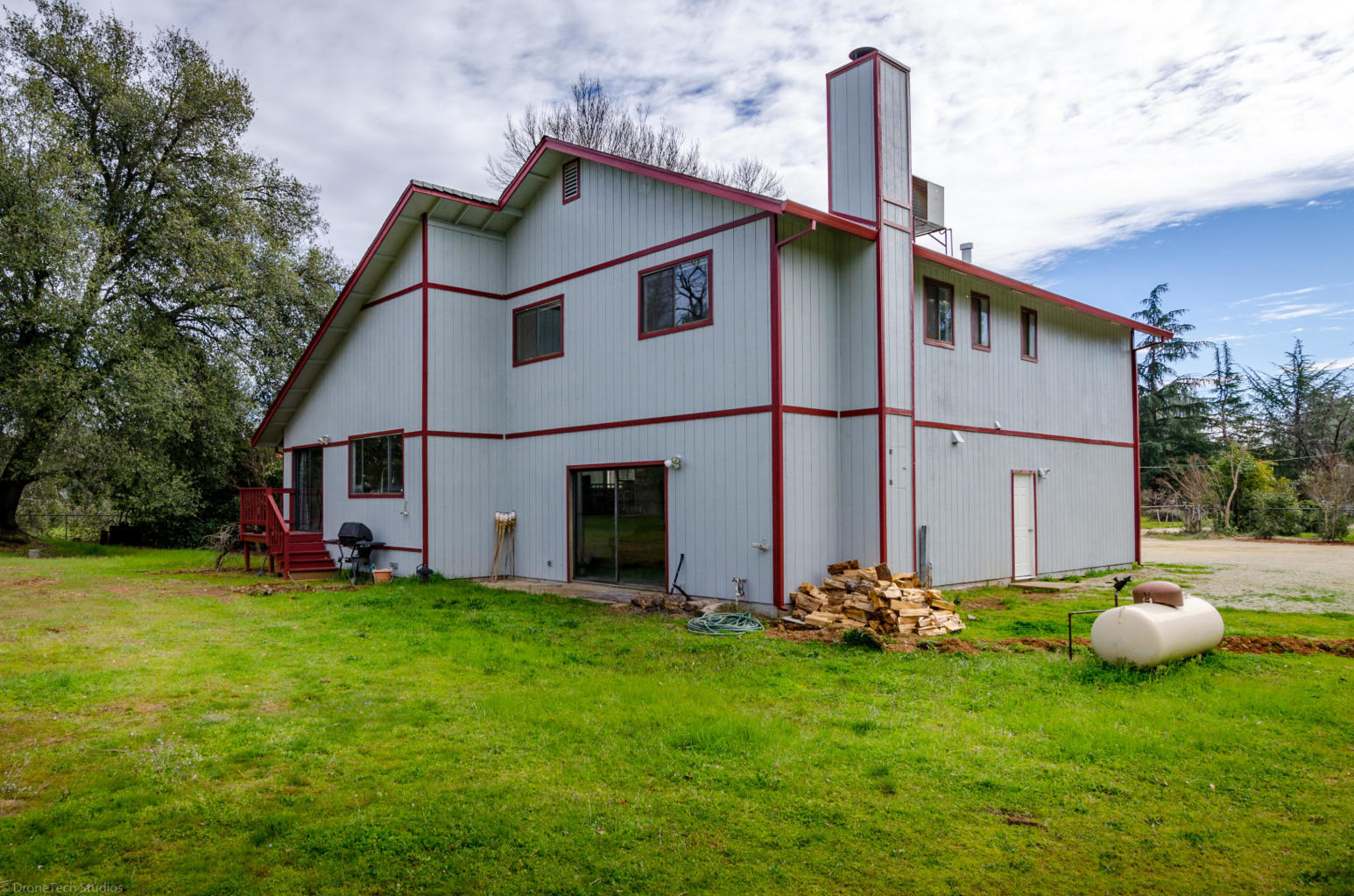 1566 Old Alturas Road Redding, CA 96003 - Photo 8 of 50 a view of a house with backyard