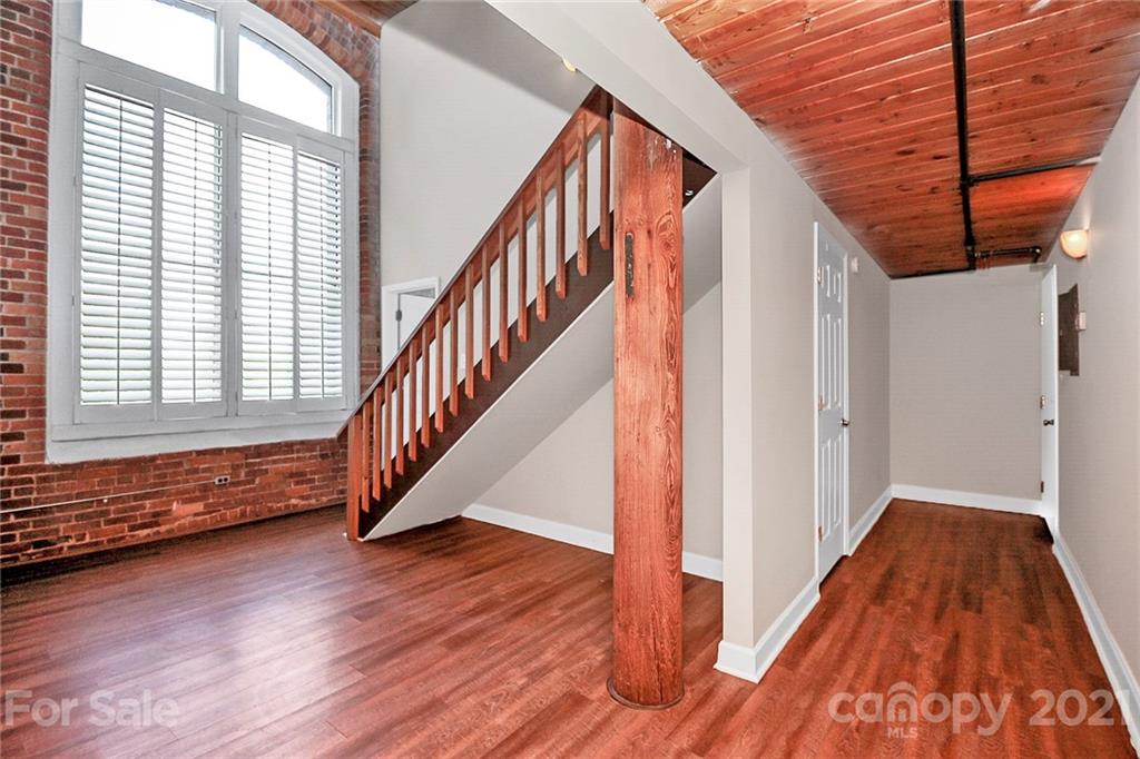 201 South Hoskins Road, Unit 237 Charlotte, NC 28208 - Photo 14 of 46 a view of an entryway with wooden floor