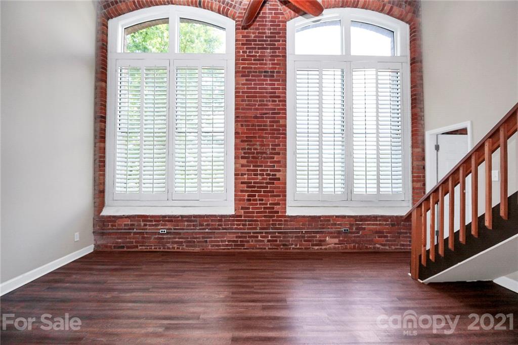 201 South Hoskins Road, Unit 237 Charlotte, NC 28208 - Photo 15 of 46 a view of an entryway with wooden floor