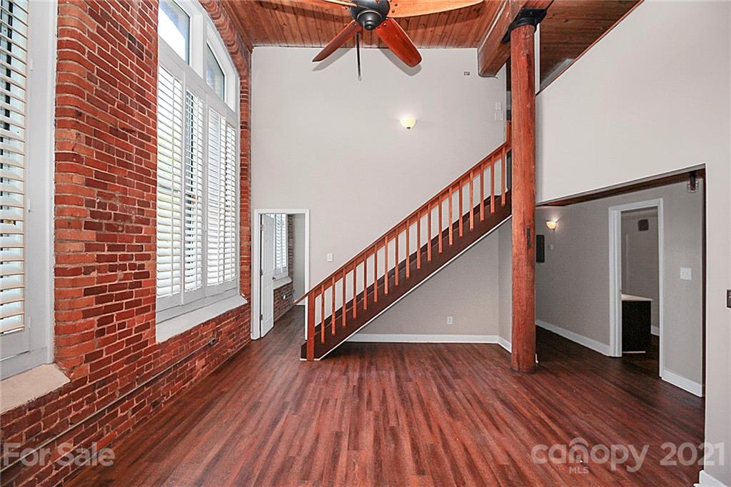 201 South Hoskins Road, Unit 237 Charlotte, NC 28208 - Photo 18 of 46 a view of entryway with wooden floor