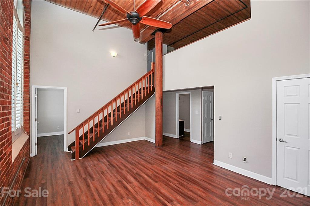 201 South Hoskins Road, Unit 237 Charlotte, NC 28208 - Photo 19 of 46 a view of entryway with wooden floor