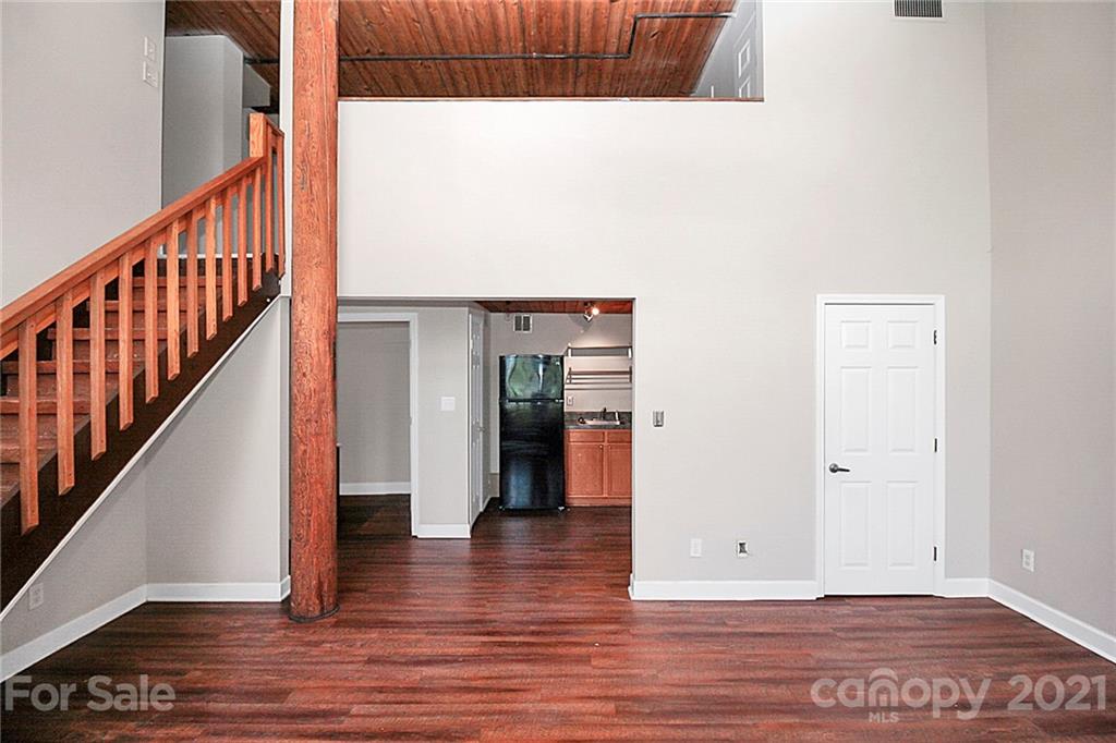 201 South Hoskins Road, Unit 237 Charlotte, NC 28208 - Photo 20 of 46 a view of an entryway with wooden floor