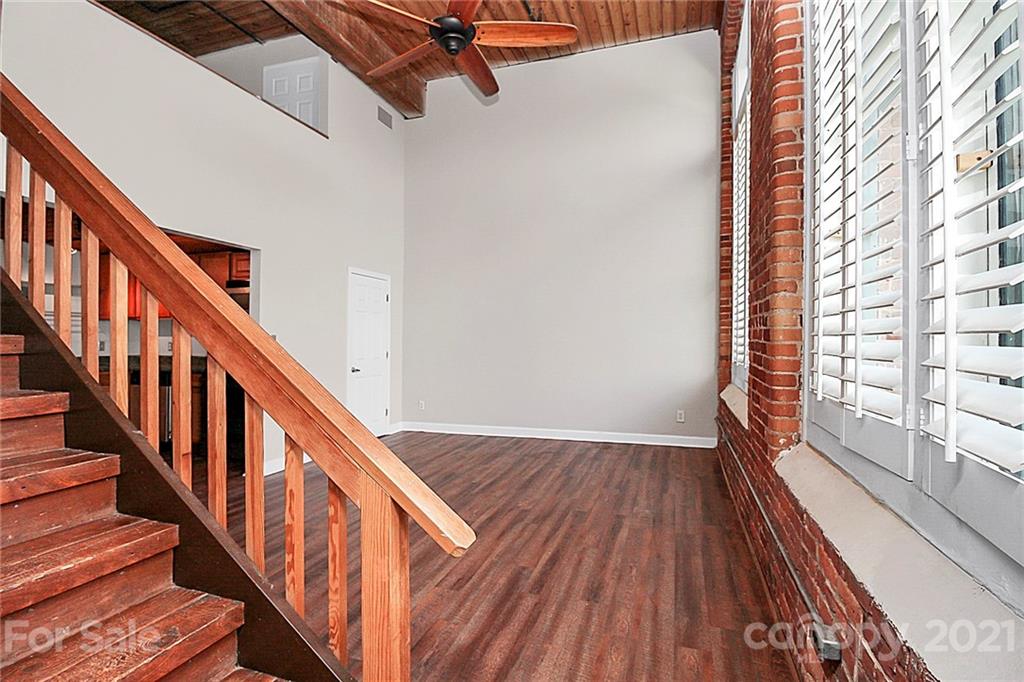201 South Hoskins Road, Unit 237 Charlotte, NC 28208 - Photo 28 of 46 a view of an entryway with wooden floor