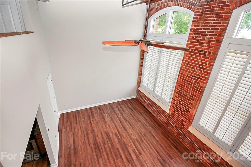 201 South Hoskins Road, Unit 237 Charlotte, NC 28208 - Photo 29 of 46 a view of an entryway with wooden floor