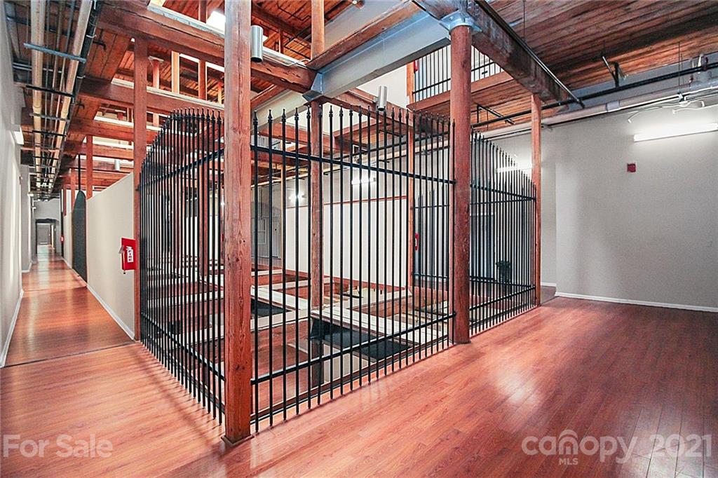 201 South Hoskins Road, Unit 237 Charlotte, NC 28208 - Photo 38 of 46 a view of staircase with wooden floor and stairs