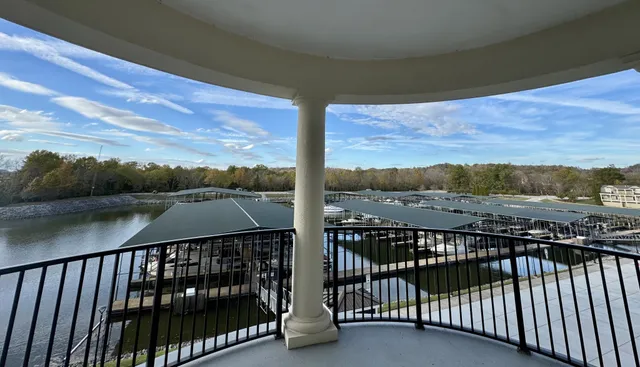 a view of wooden floor and chandelier in a room
