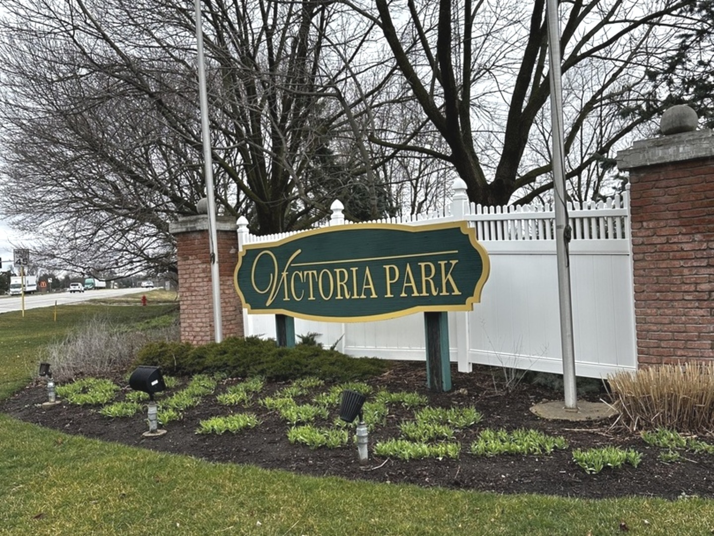 1801 Torrey Parkway Libertyville, IL 60048 - Photo 1 of 2 a view of a street sign under a large tree