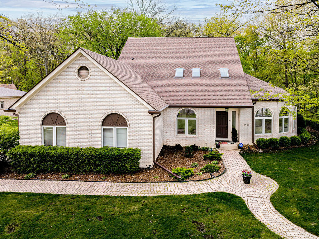 3208 Buried Oak Drive Crete, IL 60417 - Photo 1 of 26 a front view of house with yard and green space