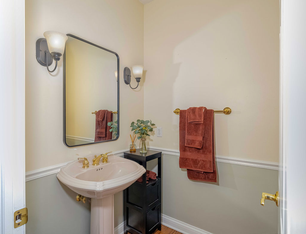 3208 Buried Oak Drive Crete, IL 60417 - Photo 11 of 26 a bathroom with a sink and a mirror