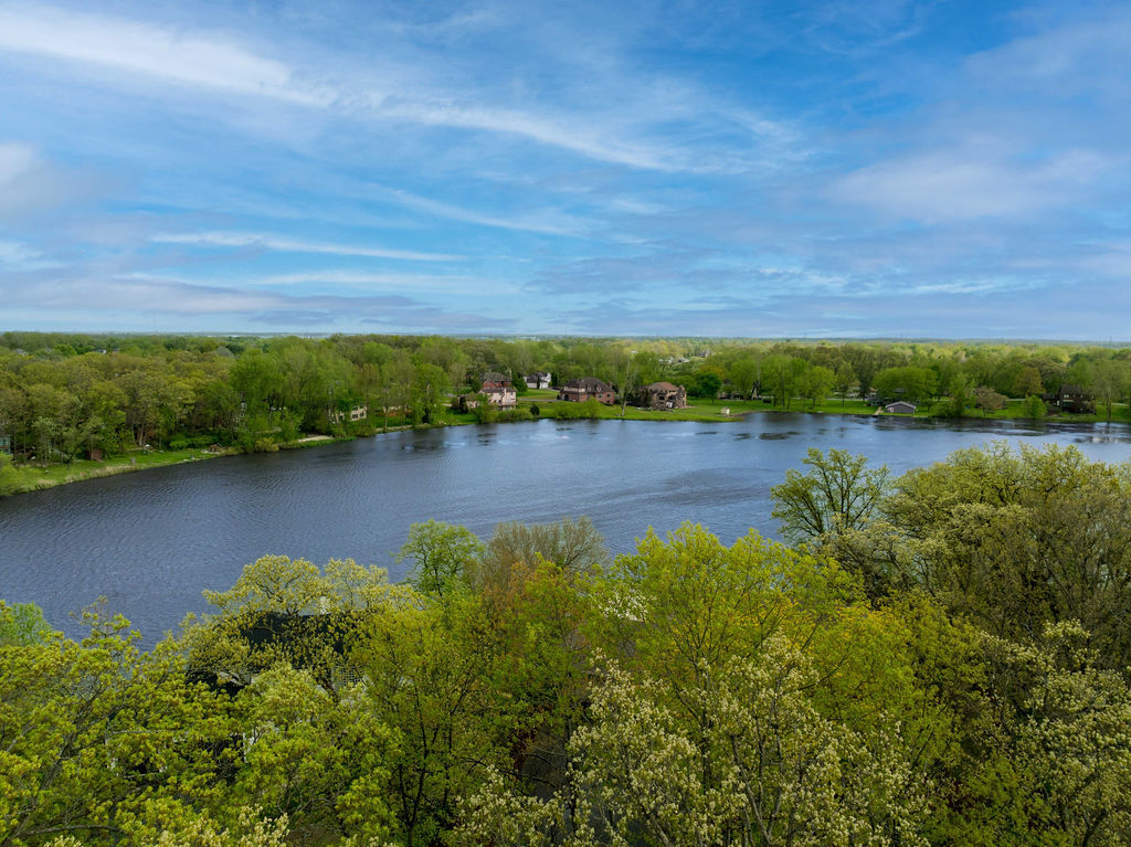 3208 Buried Oak Drive Crete, IL 60417 - Photo 26 of 26 a view of a lake with houses in the back