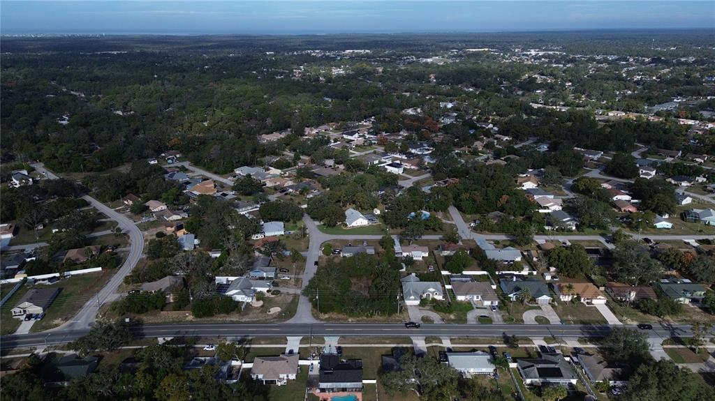 3263 Deltona Boulevard Spring Hill, FL 34606 - Photo 12 of 18 an aerial view of multiple house