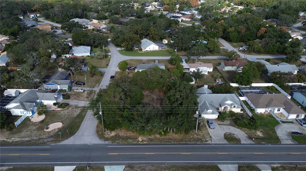3263 Deltona Boulevard Spring Hill, FL 34606 - Photo 5 of 18 an aerial view of a house