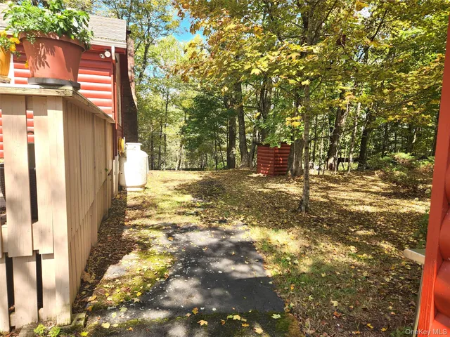 a view of an ocean with a building in the background