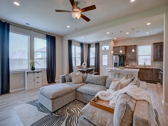 a living room with furniture and a view