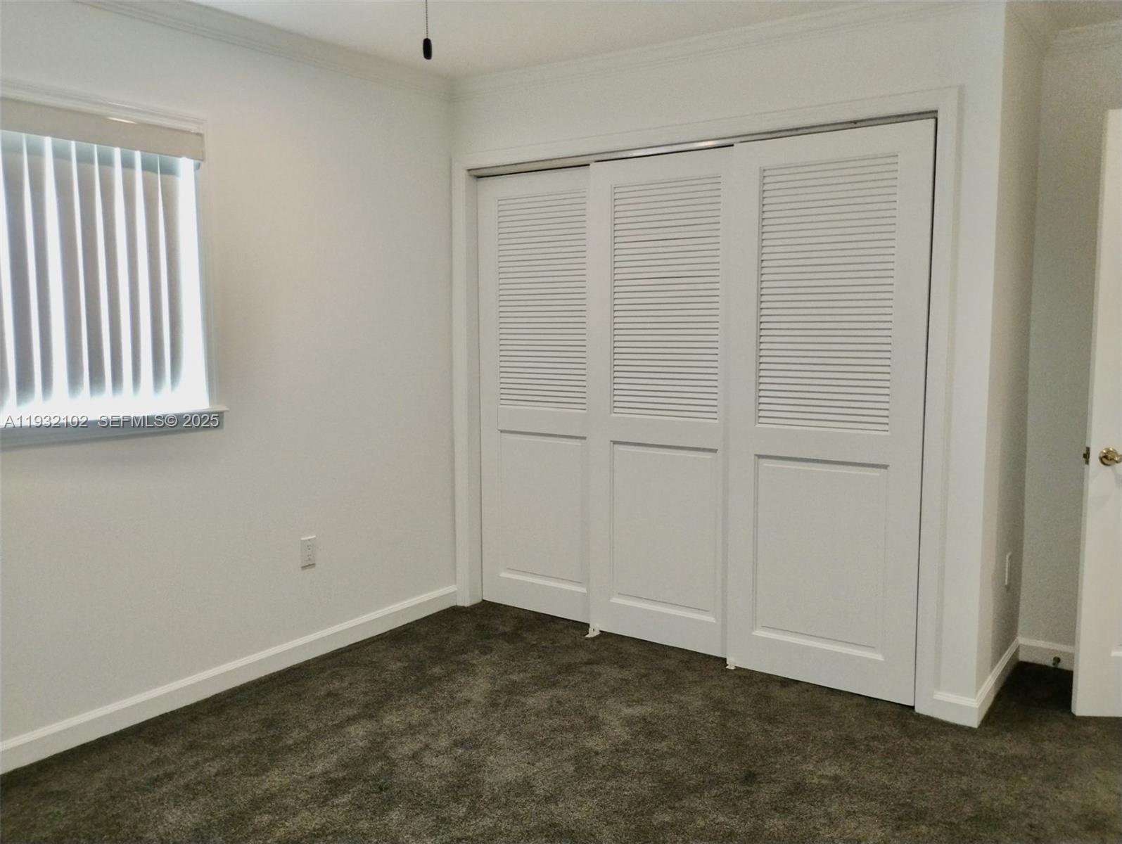 16021 Southwest 173rd Avenue Miami, FL 33187 - Photo 19 of 30 an empty room with a empty space