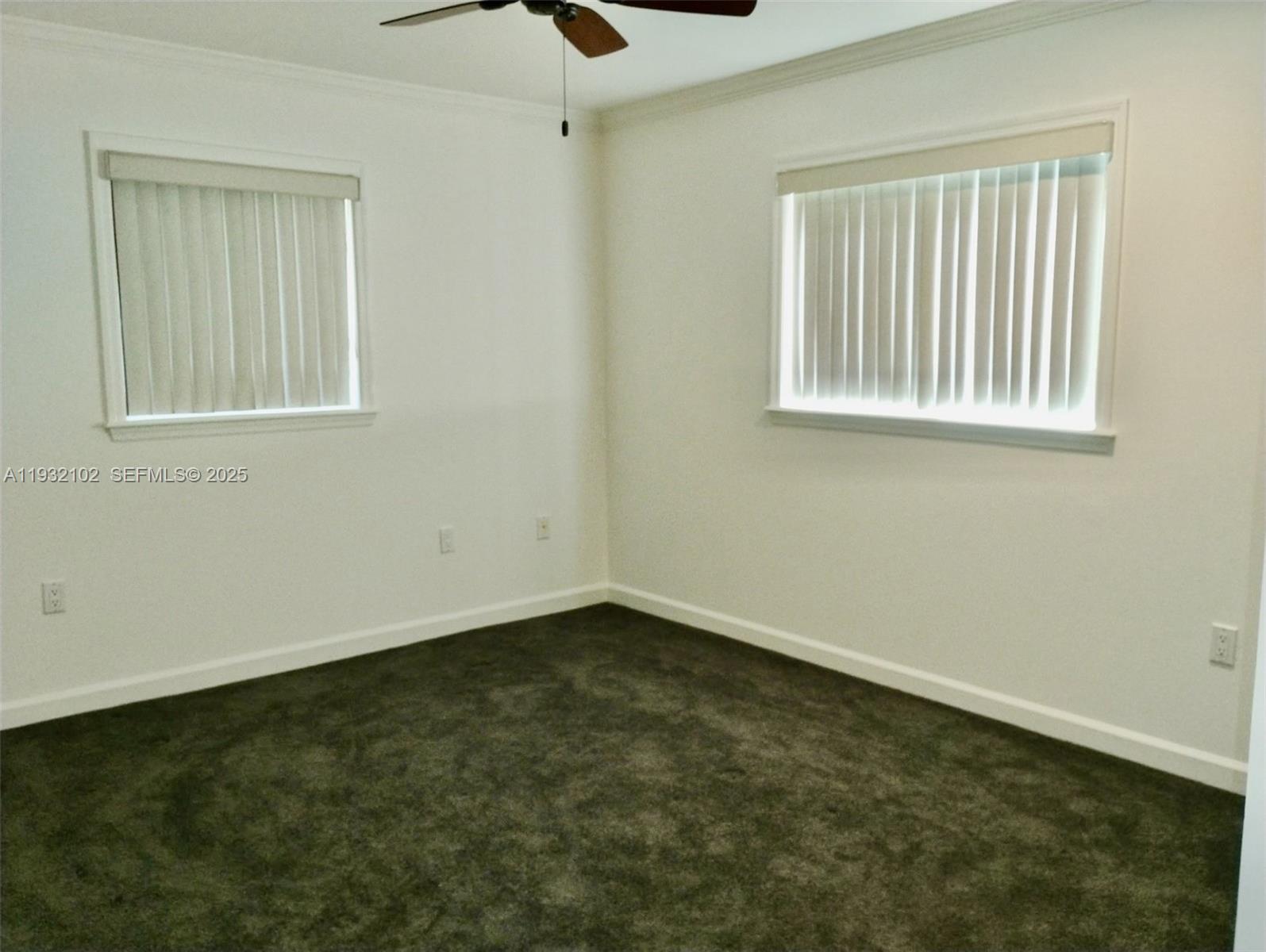 16021 Southwest 173rd Avenue Miami, FL 33187 - Photo 22 of 30 an empty room with a window