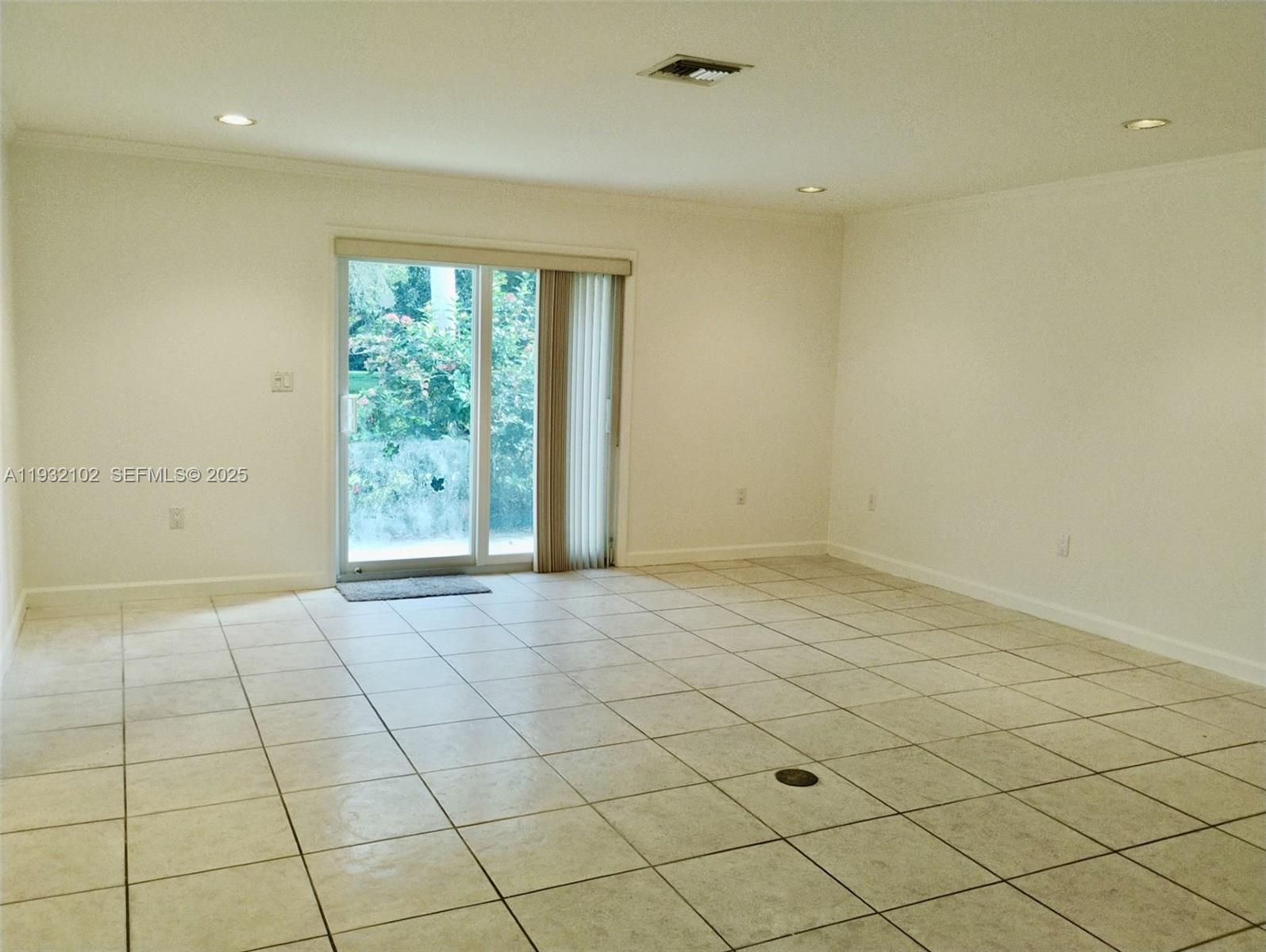 16021 Southwest 173rd Avenue Miami, FL 33187 - Photo 25 of 30 an empty room with windows