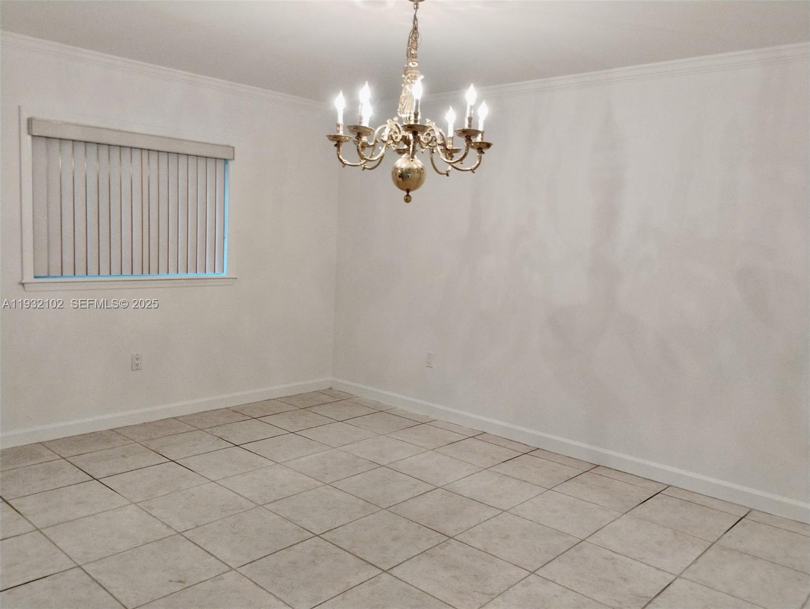 16021 Southwest 173rd Avenue Miami, FL 33187 - Photo 27 of 30 a view of livingroom with chandelier