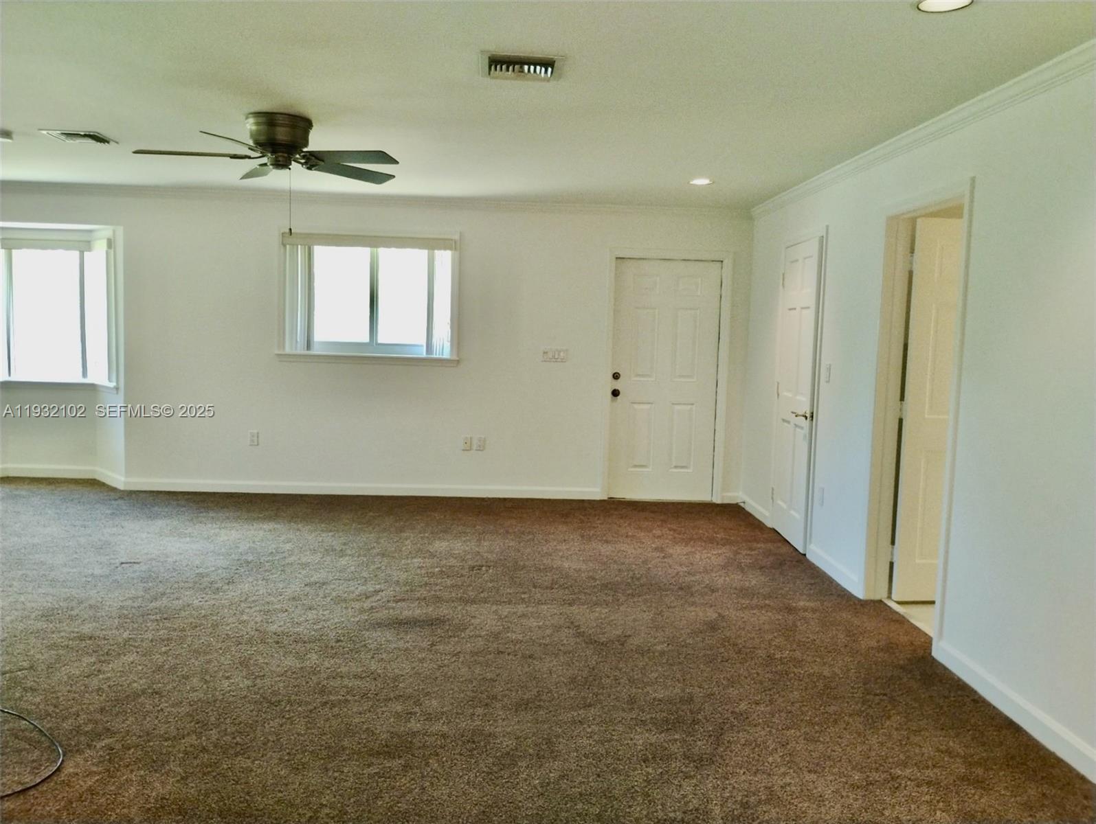 16021 Southwest 173rd Avenue Miami, FL 33187 - Photo 29 of 30 a view of a room with an empty space