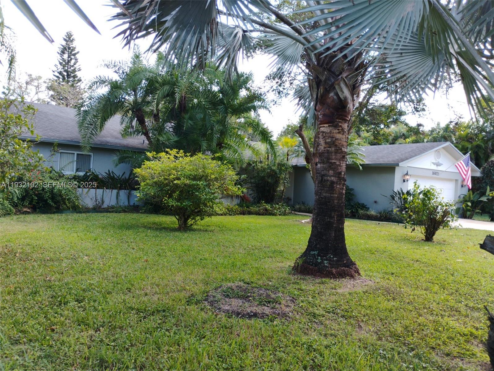 16021 Southwest 173rd Avenue Miami, FL 33187 - Photo 4 of 30 a fire hydrant in the middle of a field