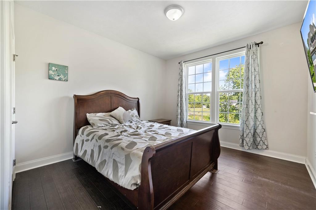 4449 Walnut Ridge Circle McDonald, PA 15057 - Photo 16 of 40 a bedroom with a bed and a window