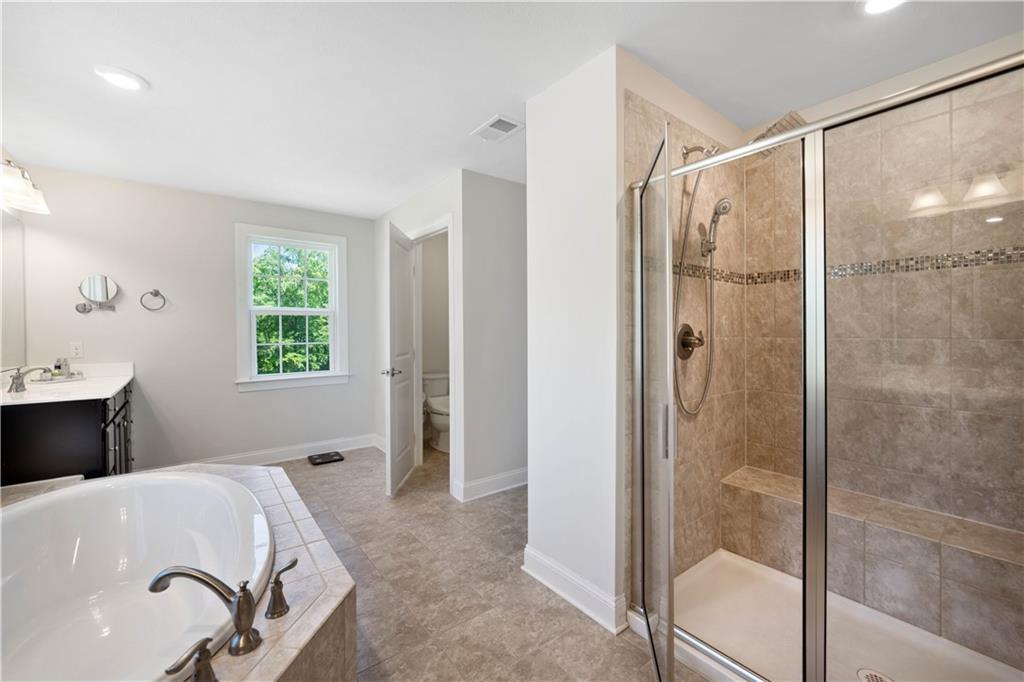 4449 Walnut Ridge Circle McDonald, PA 15057 - Photo 19 of 40 a bedroom with a bed and a window