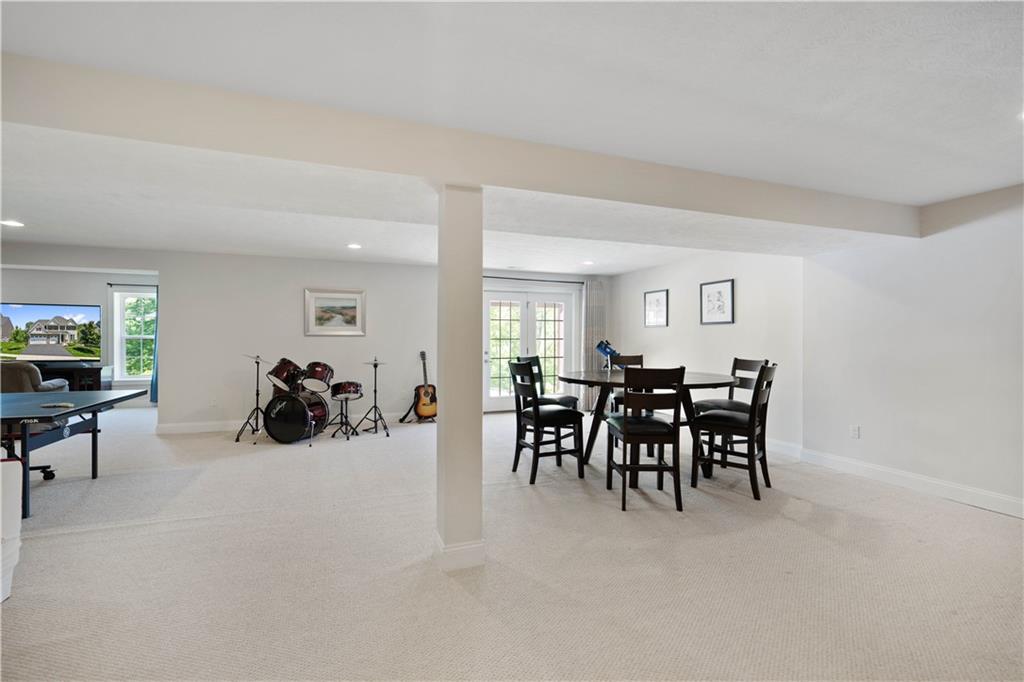 4449 Walnut Ridge Circle McDonald, PA 15057 - Photo 30 of 40 a view of a livingroom and a dining room with furniture and chandelier