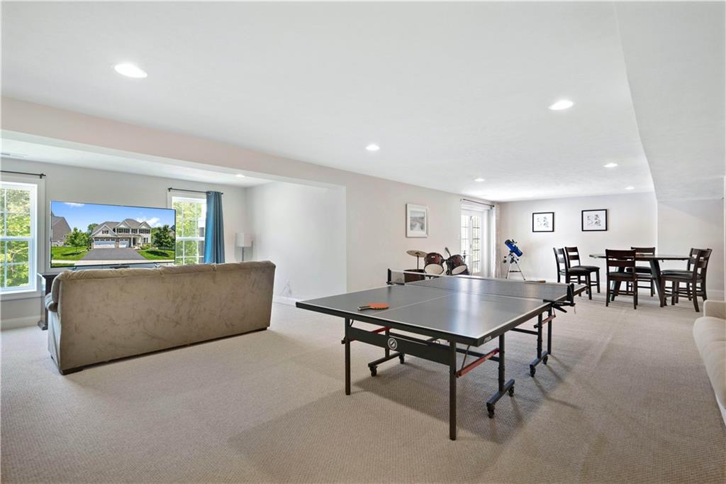 4449 Walnut Ridge Circle McDonald, PA 15057 - Photo 32 of 40 a living room with furniture a table and a potted plant