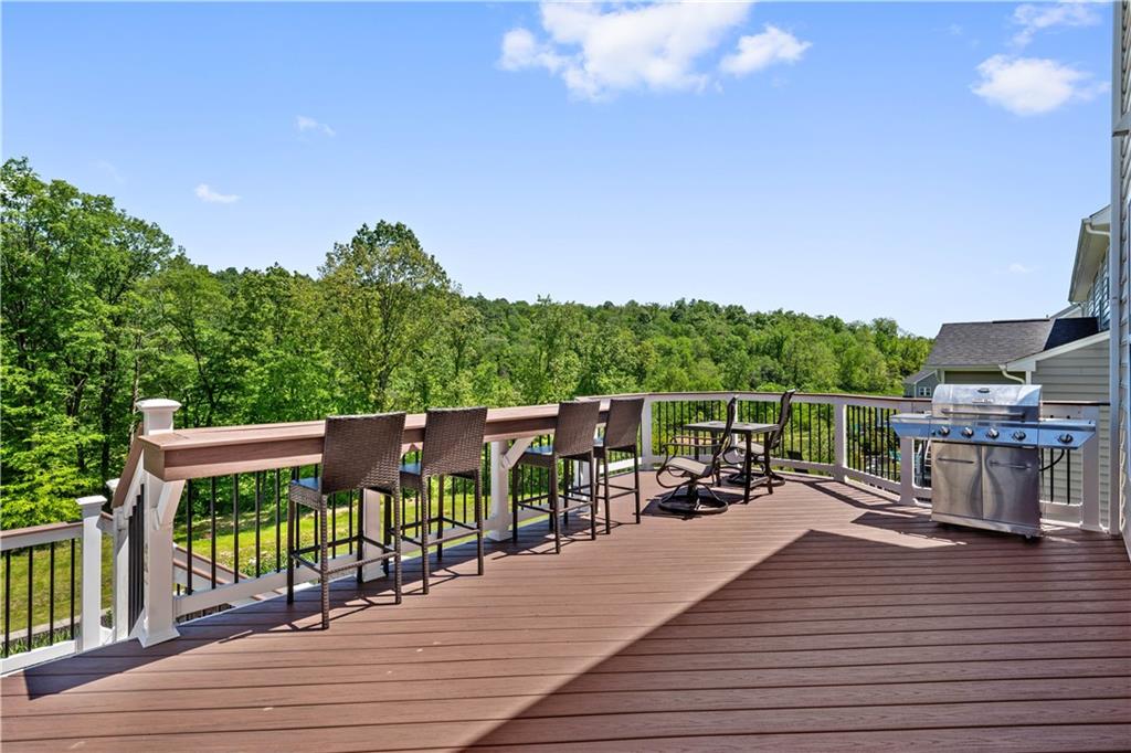 4449 Walnut Ridge Circle McDonald, PA 15057 - Photo 34 of 40 a view of a roof deck with wooden floor and fence