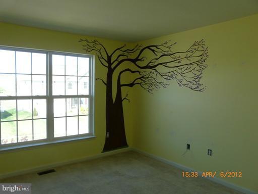 78 Glenbrook Road Ranson, WV 25438 - Photo 13 of 17 a view of a room with window and a ceiling fan
