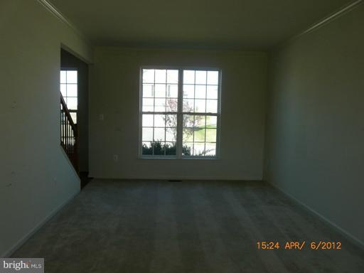78 Glenbrook Road Ranson, WV 25438 - Photo 14 of 17 an empty room with windows