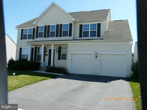 78 Glenbrook Road Ranson, WV 25438 - Photo 17 of 17 a front view of a house with a yard