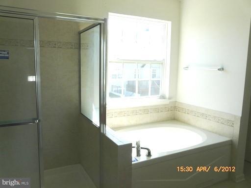 78 Glenbrook Road Ranson, WV 25438 - Photo 3 of 17 a bathroom with a shower
