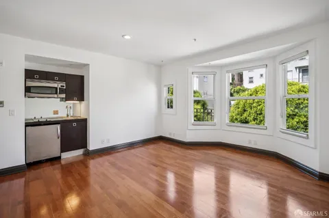 an empty room with windows