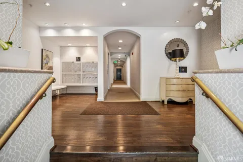 a view of living room with furniture and flat screen tv