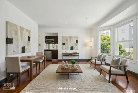 a view of livingroom with hardwood floor and window