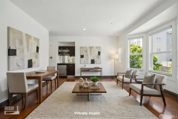 a view of livingroom with hardwood floor and window