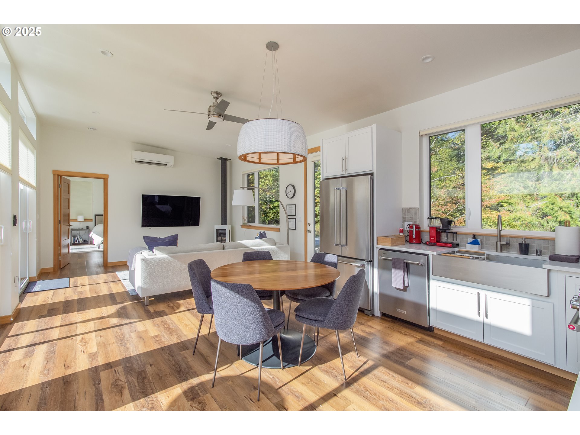 288 Baker Road Randle, WA 98377 - Photo 11 of 48 a view of a dining room with furniture window and wooden floor