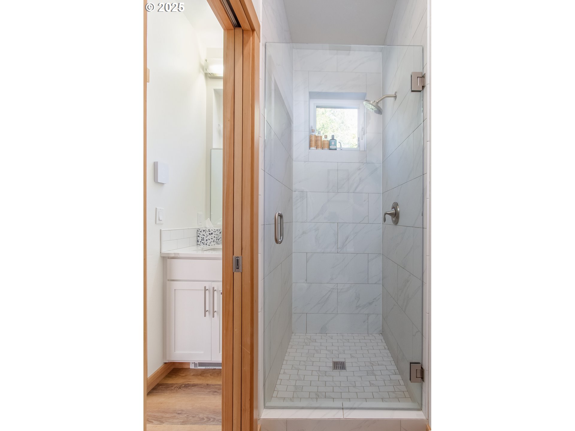 288 Baker Road Randle, WA 98377 - Photo 15 of 48 a bathroom with a glass shower door