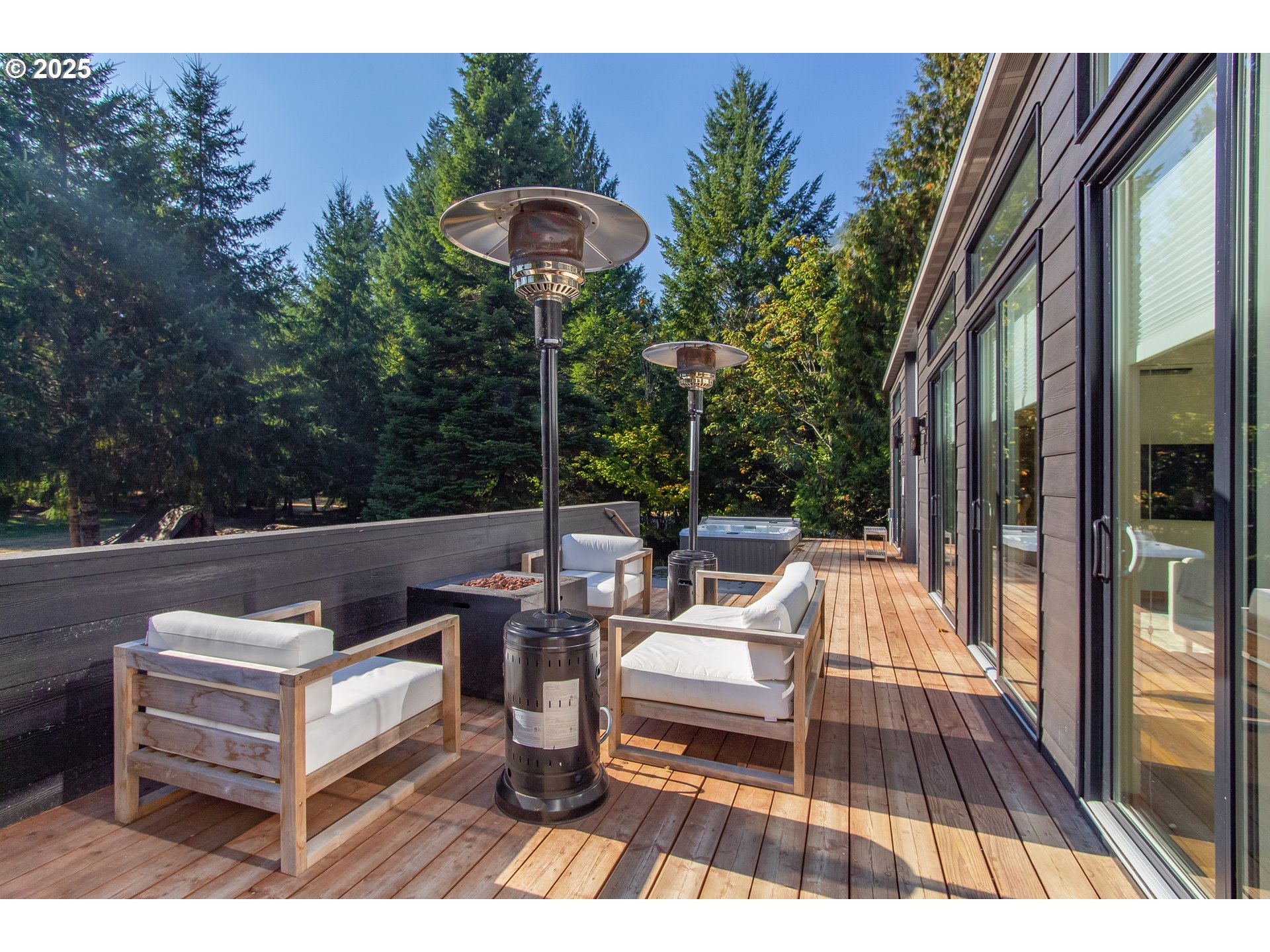 288 Baker Road Randle, WA 98377 - Photo 17 of 48 a view of a patio with a table chairs and a patio