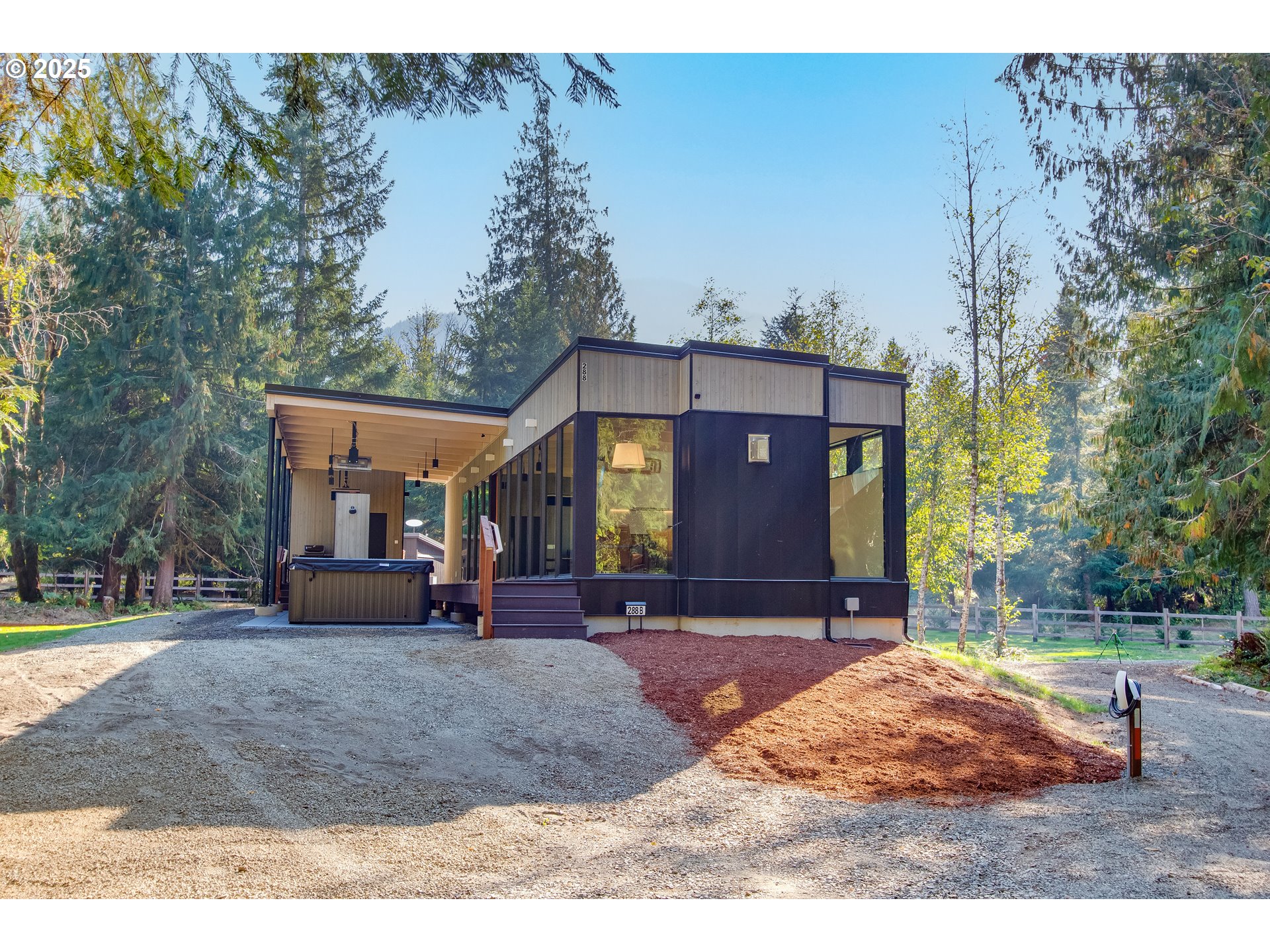 288 Baker Road Randle, WA 98377 - Photo 2 of 48 a backyard of a house with table and chairs